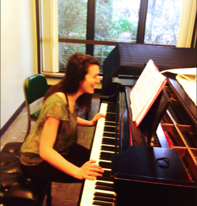 Nyssa Collins playing piano