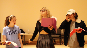 Three people acting for the play Nia