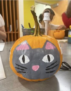 Pumpkin with a cat painted on